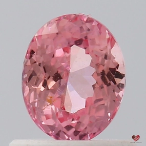 0.90cts Oval Copper Salmon Sapphire